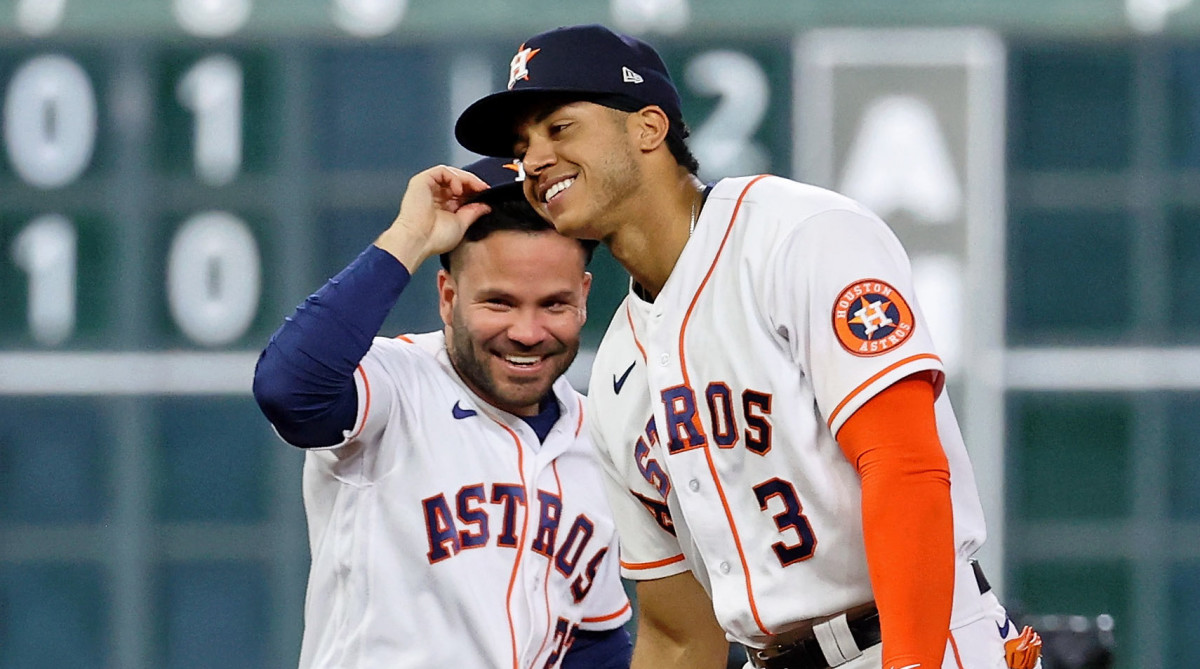 Astros infielders Jose Altuve, left, and Jeremy Peña celebrate Houston’s win in Game 1 of the 2022 ALCS.